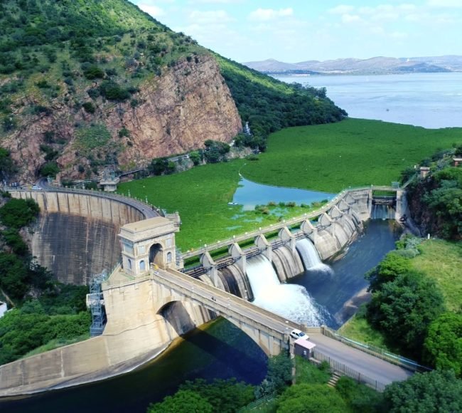 Scenic helicopter flight Hartbeespoort Dam wall and Magaliesberg mountains